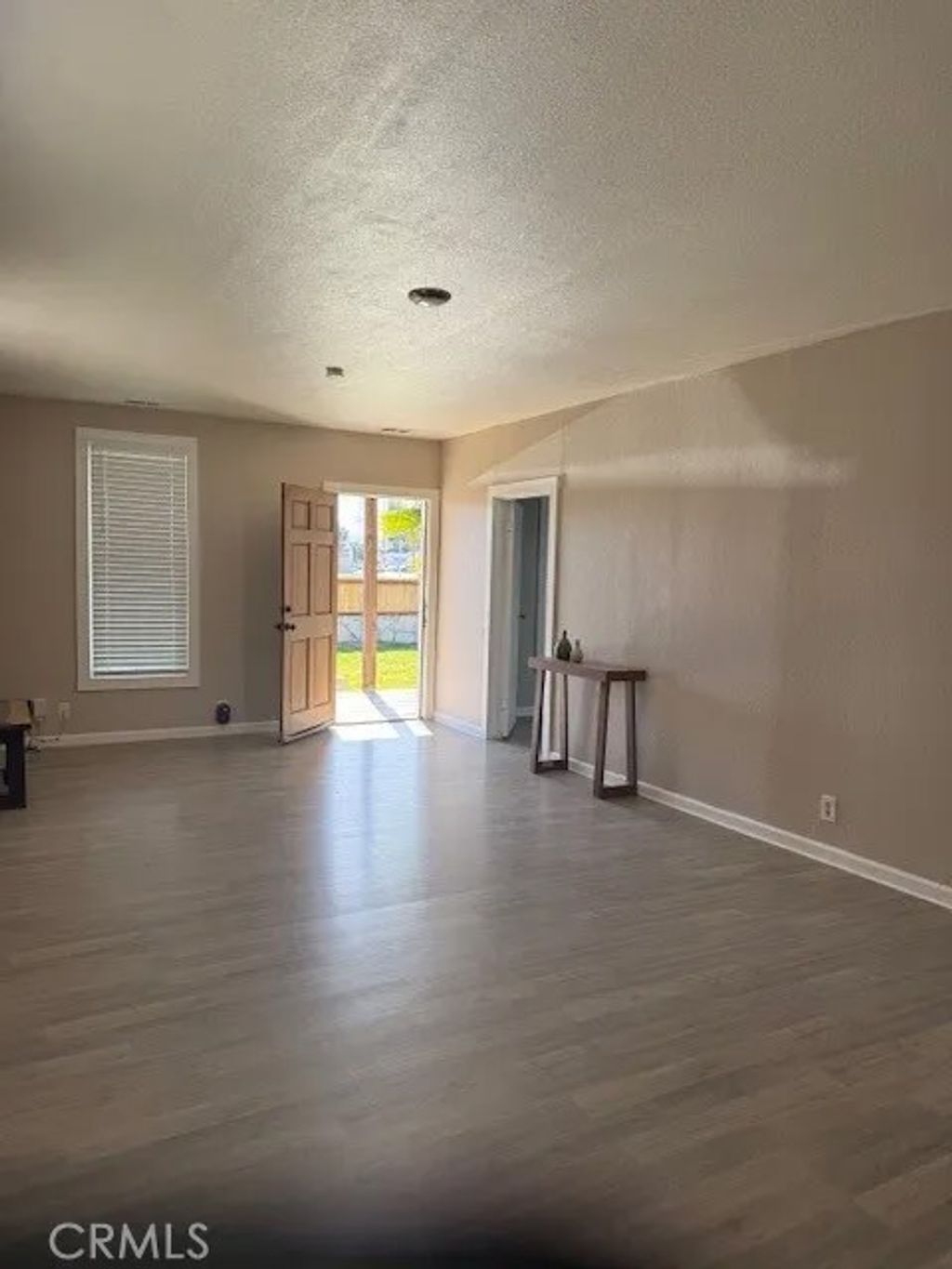 Photo of 941 W Oldfield St, Lancaster, CA 93534 (MLS # SR26026751)