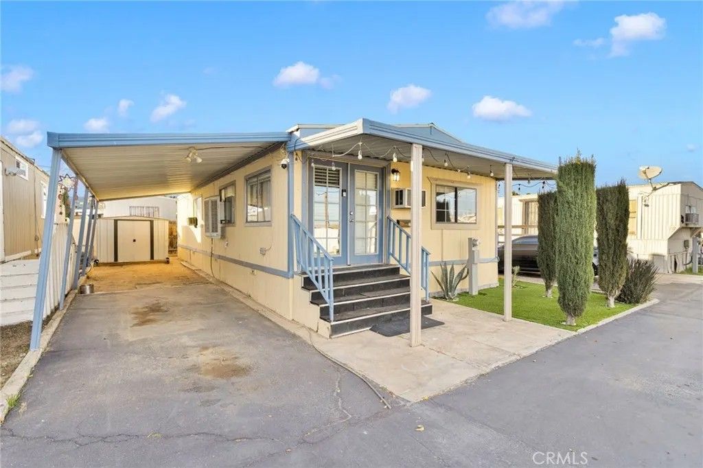 Photo of 16473 Green Tree Blvd #21, Victorville, CA 92395 (MLS # HD25278497)