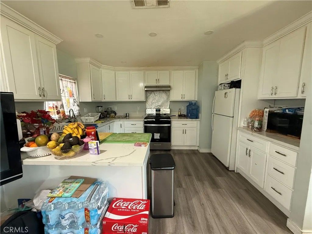 Photo of 221 S Howard Street, Corona, CA 92879 (MLS # PW26025940)