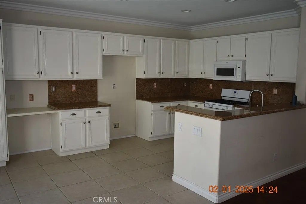 Photo of 4257 Castlepeak Dr, Corona, CA 92883 (MLS # IG25276632)