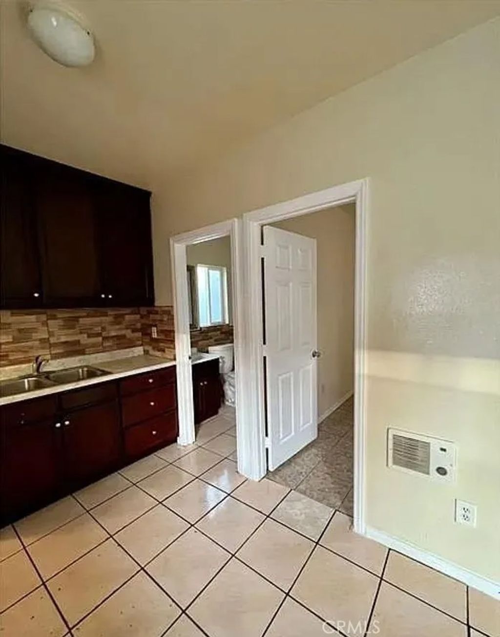 Photo of 1336 W 109 Street, Los Angeles, CA 90044 (MLS # IN26044595)