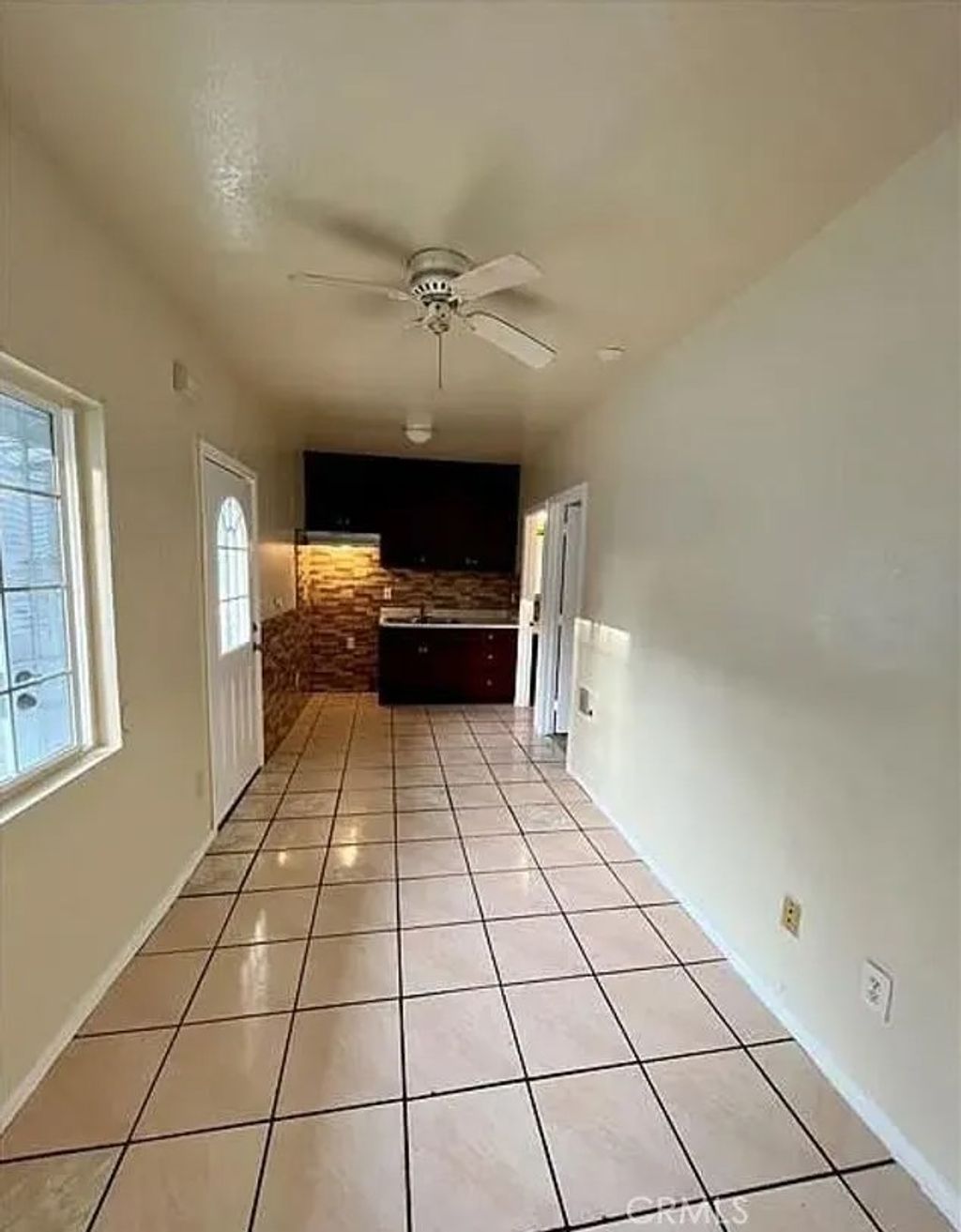 Photo of 1336 W 109 Street, Los Angeles, CA 90044 (MLS # IN26044595)