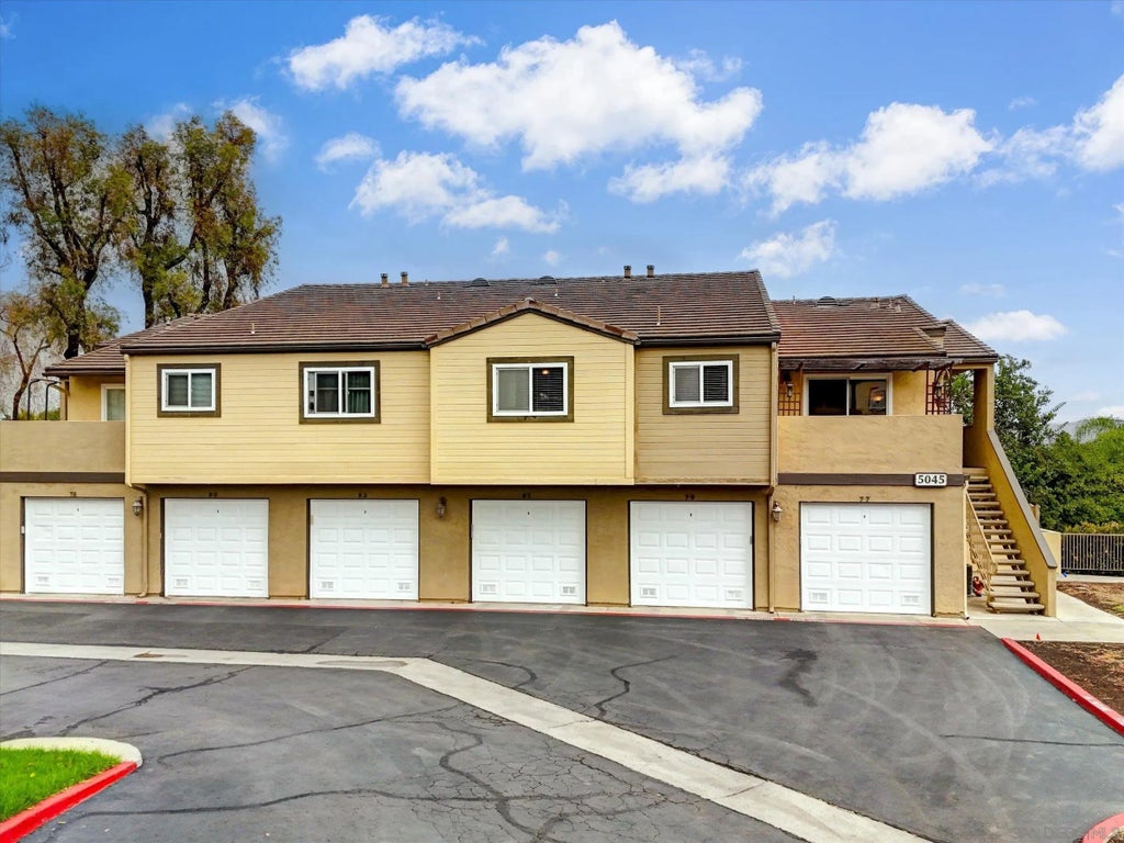 Photo of 5045 Los Morros Way #83, Oceanside, CA 92057 (MLS # 260023111)