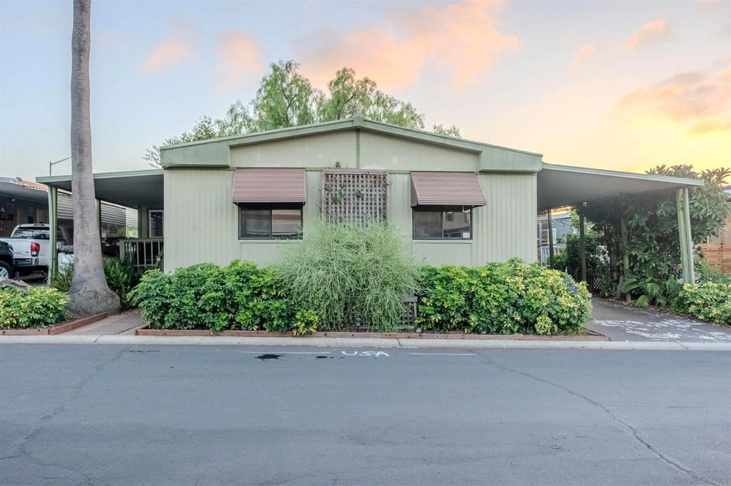 Photo of 155 Las Flores Dr DR #117, San Marcos, CA 92069 (MLS # 260024614)