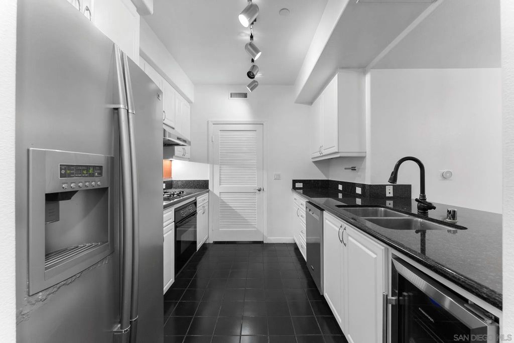 Photo of 8211 Station Village Ln #1111, San Diego, CA 92108 (MLS # 250041551)