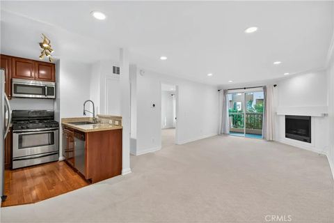 Photo of 5540 Owensmouth Ave #209, Woodland Hills, CA 91367 (MLS # SR25245148)