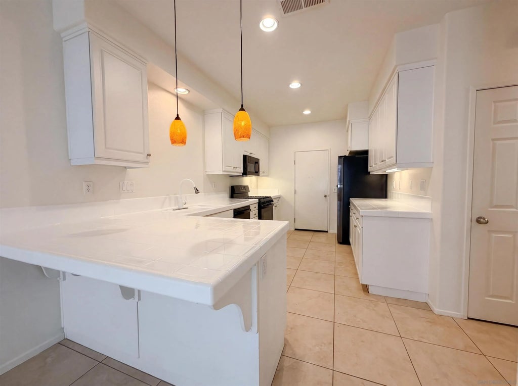 Photo of 1438 Trouville LN #4, Chula Vista, CA 91913 (MLS # 260013797)