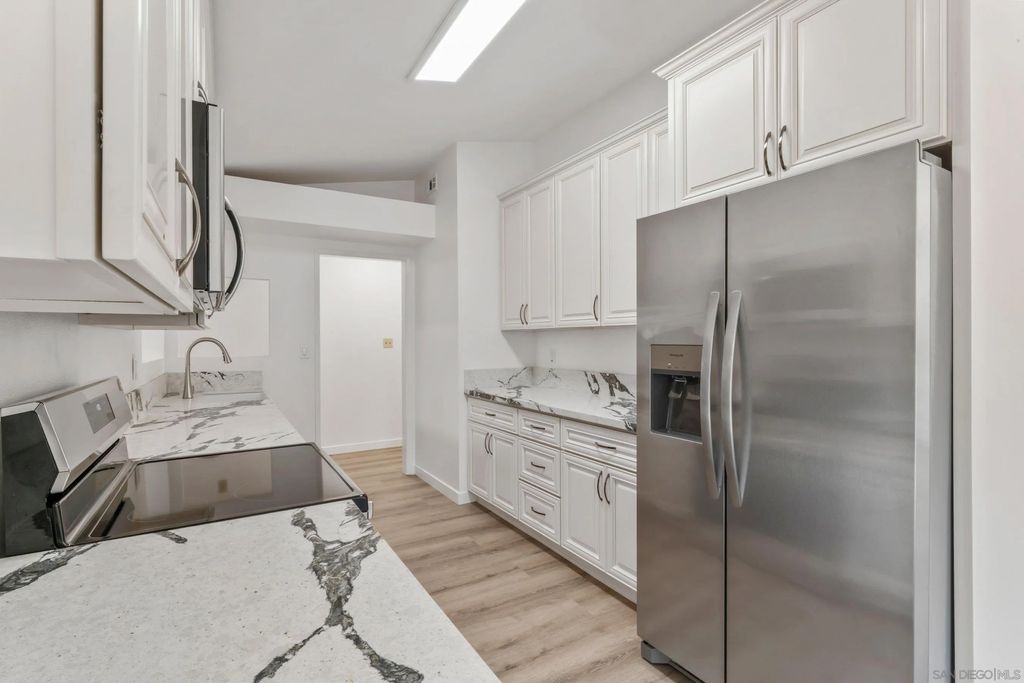 Photo of 2663 Tonto Way, San Diego, CA 92117 (MLS # 2601041)