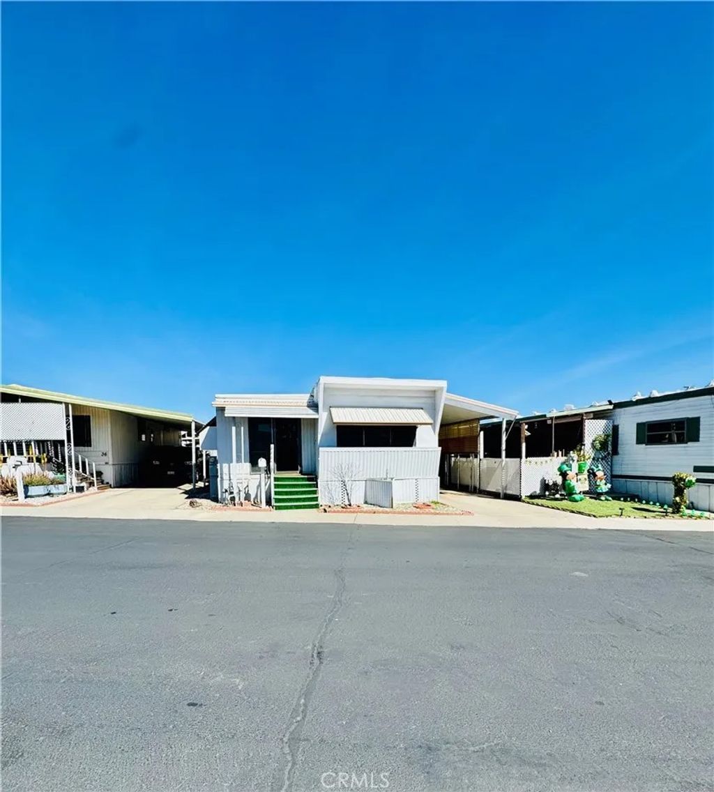 Photo of 5580 Moreno St #37, Montclair, CA 91763 (MLS # IV26059771)