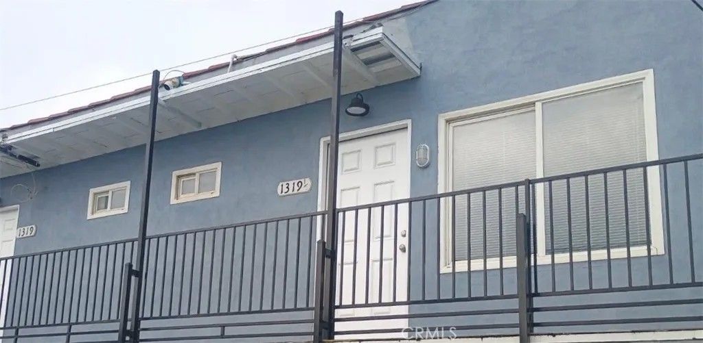 Photo of 1319 W 92nd St, Los Angeles, CA 90044 (MLS # SB26040350)