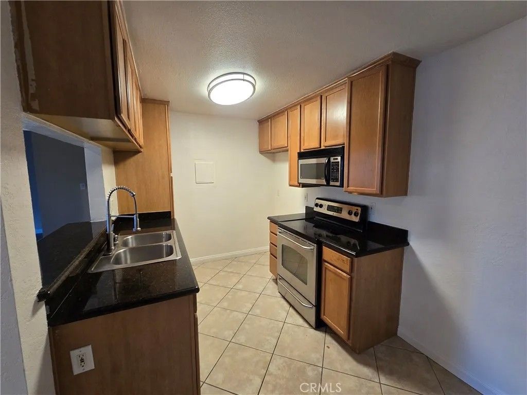 Photo of 1345 Cabrillo Park Drive #E01, Santa Ana, CA 92701 (MLS # OC26095528)
