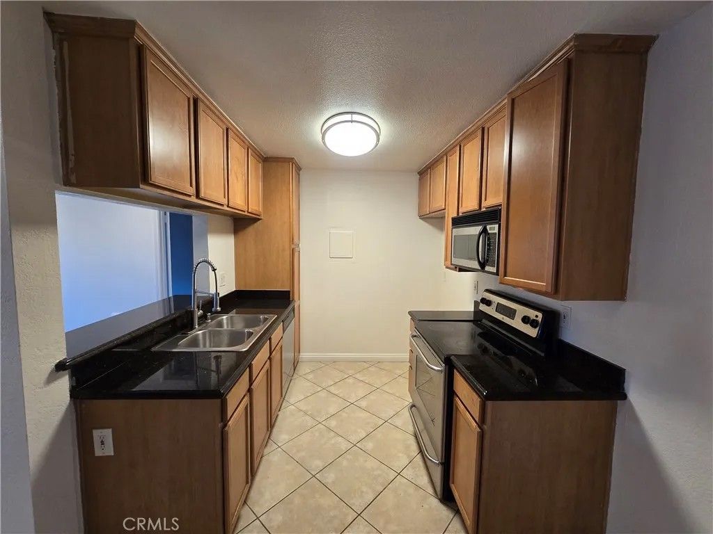 Photo of 1345 Cabrillo Park Drive #E01, Santa Ana, CA 92701 (MLS # OC26095528)