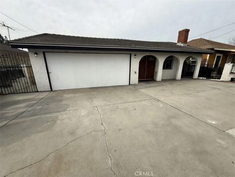 Photo of 209 N Stimson Ave, La Puente, CA 91744 (MLS # CV26016230)