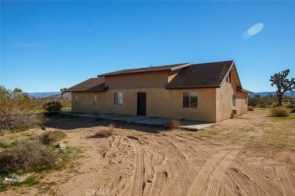Photo of 59375 Breezy Ln, Yucca Valley, CA 92284 (MLS # OC26005536)