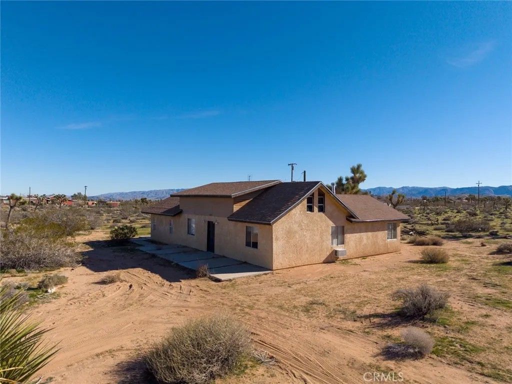 Photo of 59375 Breezy Ln, Yucca Valley, CA 92284 (MLS # OC26005536)