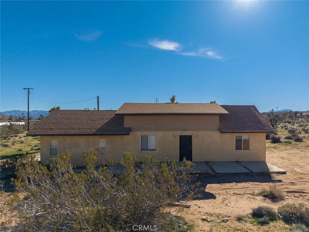 Photo of 59375 Breezy Ln, Yucca Valley, CA 92284 (MLS # OC26005536)