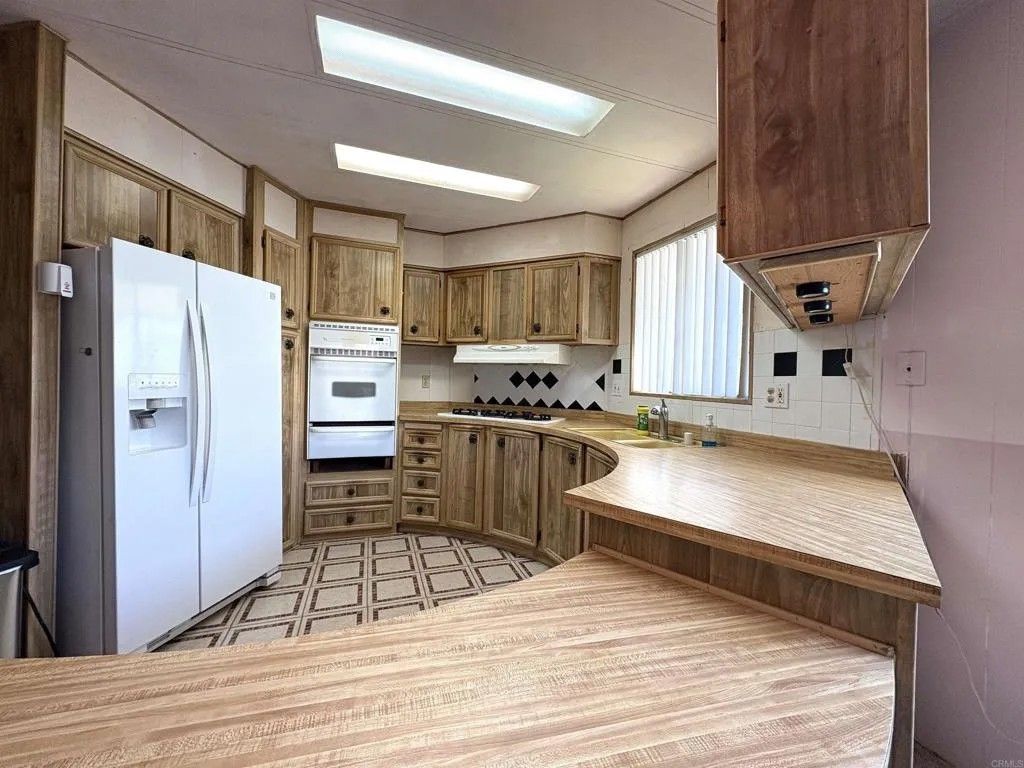 Photo of 7467 Mission Gorge Rd #293, Santee, CA 92071 (MLS # PTP2602686)