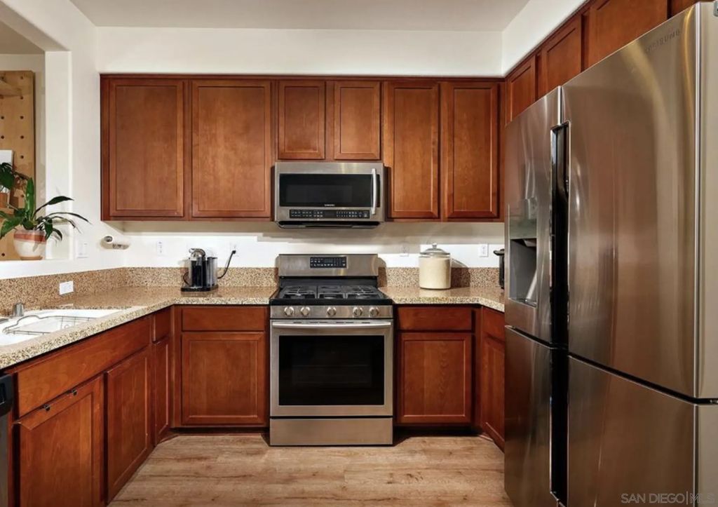 Photo of 1635 Santa Alexia Pl #6, Chula Vista, CA 91913 (MLS # 260007276)