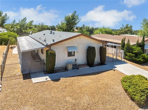 Photo of 13866 Tam O Shanter Drive, Victorville, CA 92395 (MLS # HD26123644)