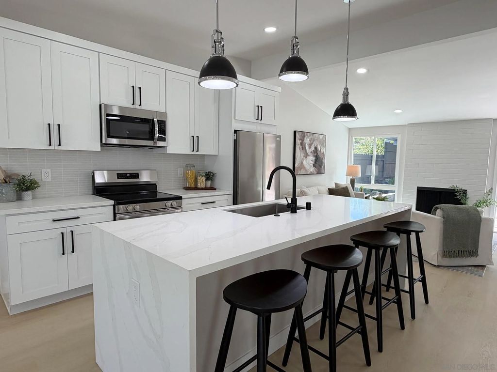 Photo of 3418 Angwin Dr, San Diego, CA 92123 (MLS # 260006973)