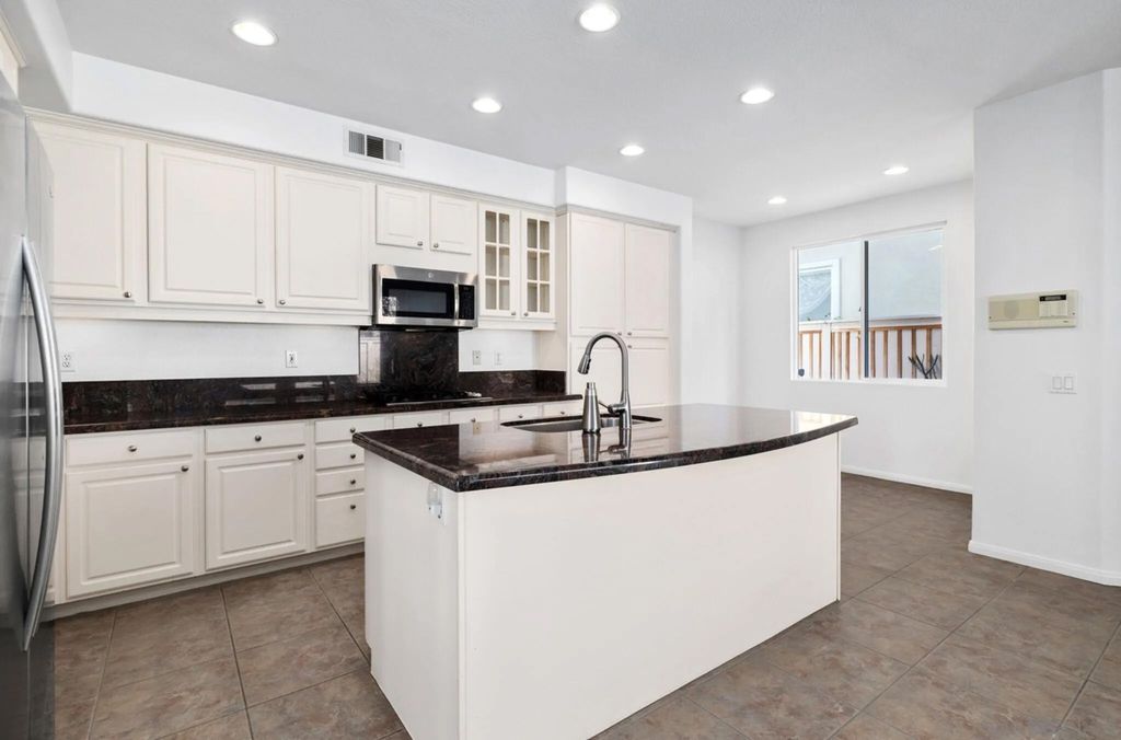 Photo of 2642 W Canyon Ave, San Diego, CA 92123 (MLS # 260007473)