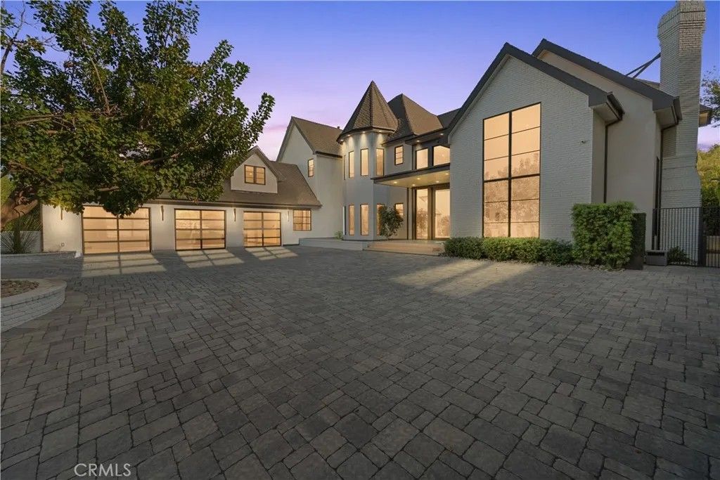 Photo of 20620 Chatsboro Drive, Woodland Hills, CA 91364 (MLS # SR25241142)