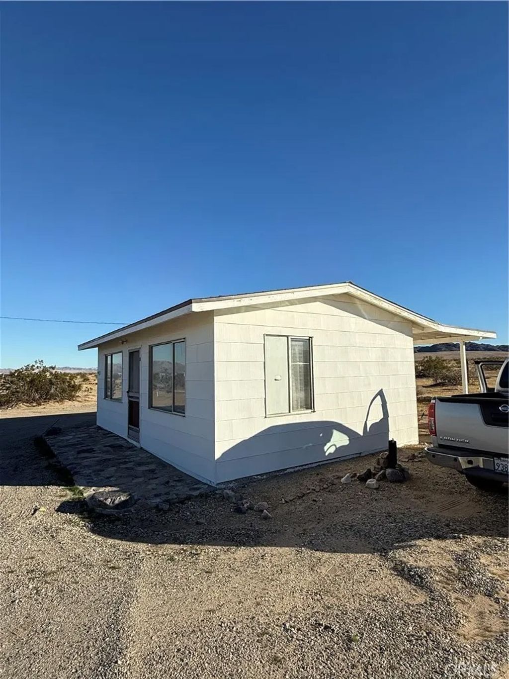 Photo of 86725 Misty Trl, 29 Palms, CA 92277 (MLS # JT26063900)