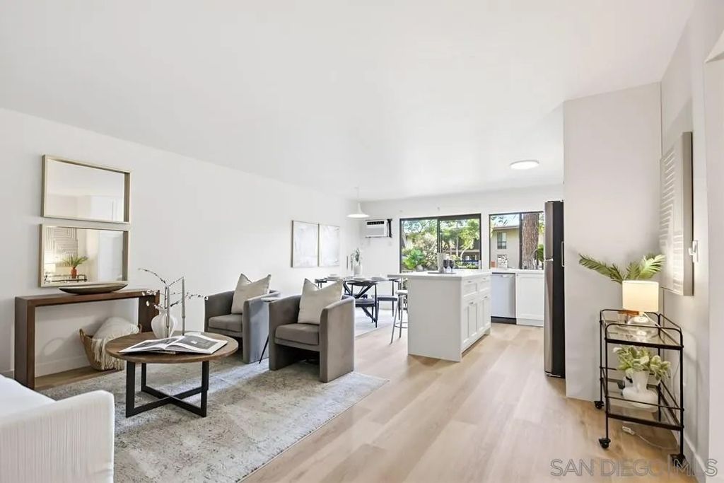 Photo of 7858 Cowles Mountain Ct #D7, San Diego, CA 92119 (MLS # 250044091)