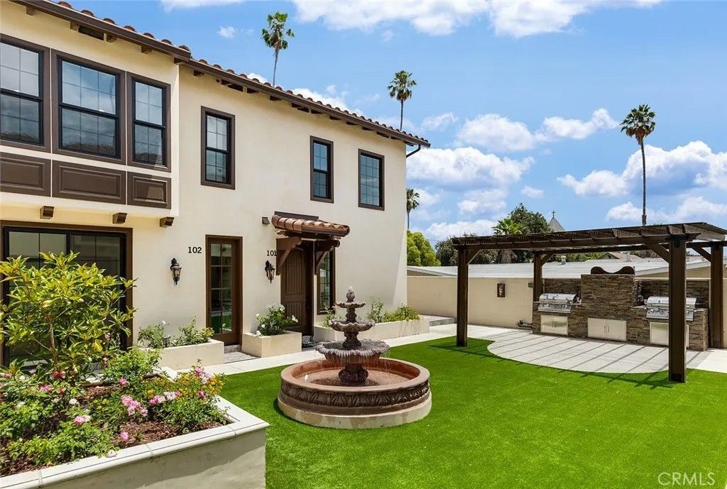 Photo of 89 N Grand Oaks Ave #103, Pasadena, CA 91107 (MLS # WS26081737)