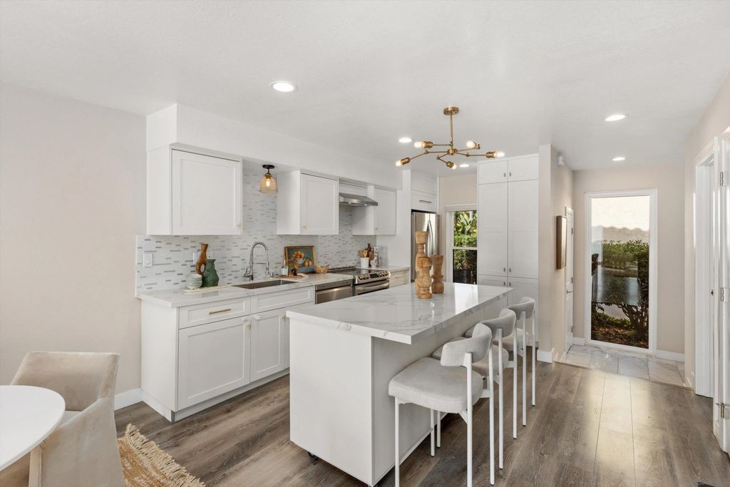 Photo of 1913 Alga Rd #A, Carlsbad, CA 92009 (MLS # 260012292)