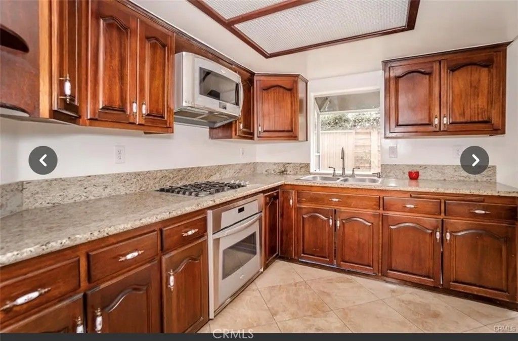Photo of 9846 California Ave, South Gate, CA 90280 (MLS # CV26092266)