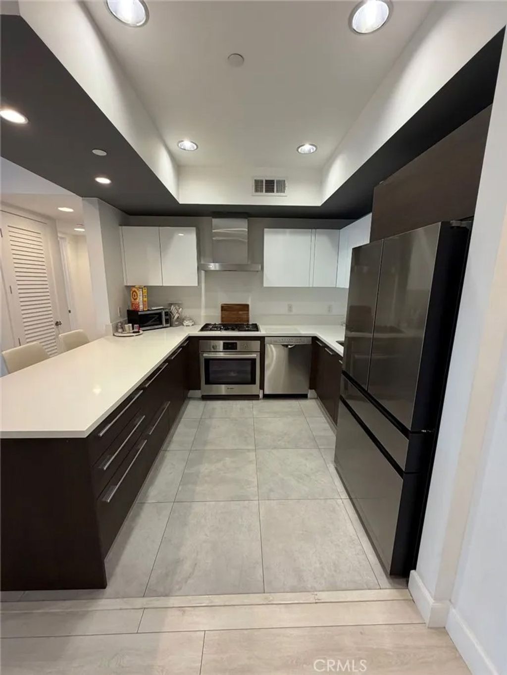 Photo of 118 S Kenwood St #404, Glendale, CA 91205 (MLS # SR26034646)