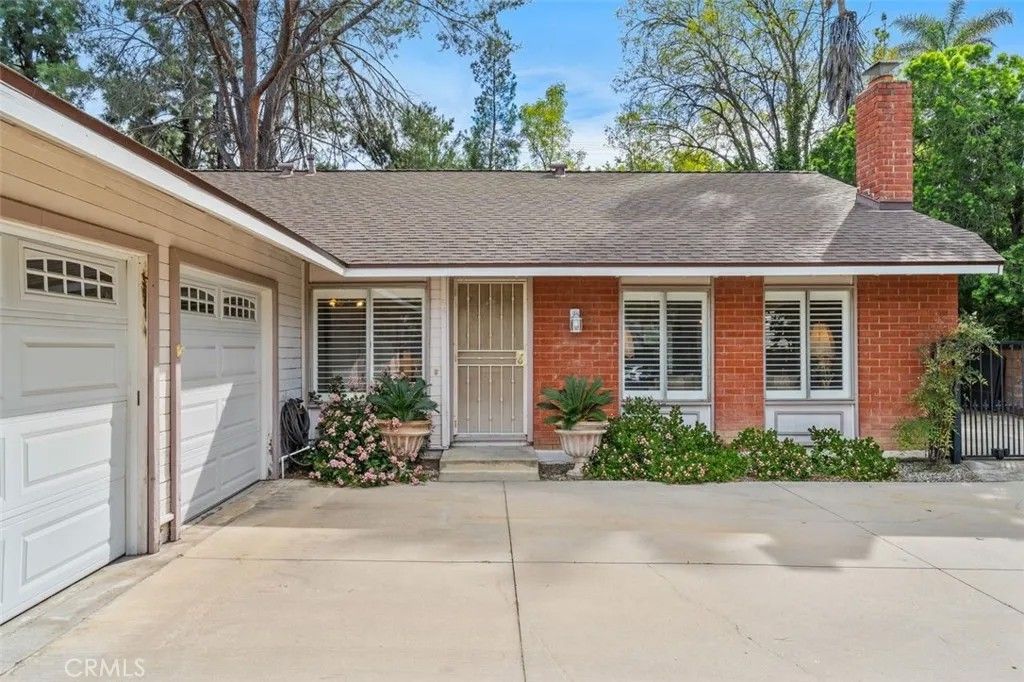 Photo of 8401 Natalie Lane, West Hills, CA 91304 (MLS # SR26059292)