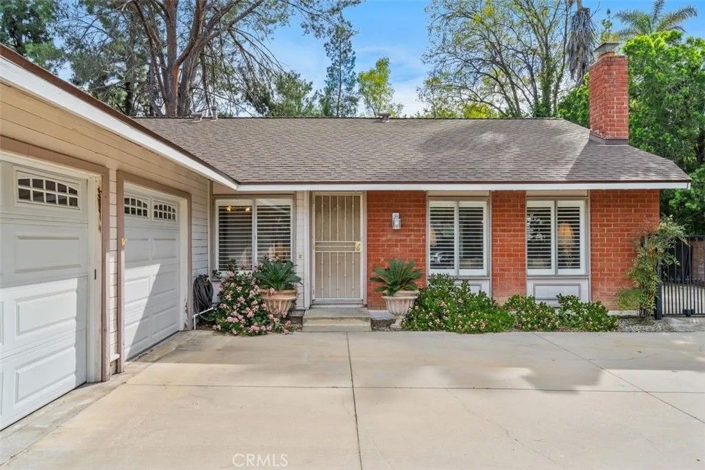 Photo of 8401 Natalie Lane, West Hills, CA 91304 (MLS # SR26059292)