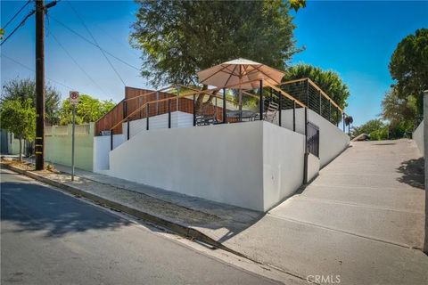 Photo of 6150 Strickland Avenue, Los Angeles, CA 90042 (MLS # DW25274429)