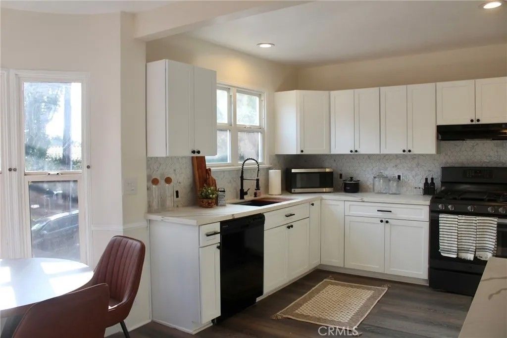 Photo of 5351 Packard Street, Los Angeles, CA 90019 (MLS # SW26091311)