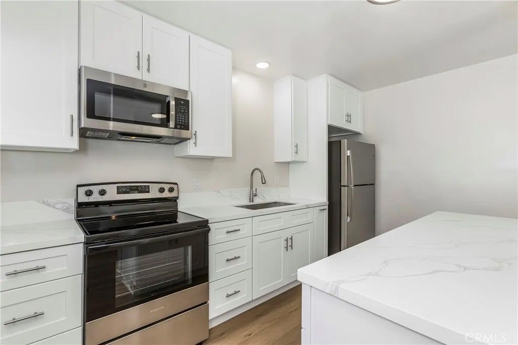 Photo of 10327 Flora Vista Avenue, Bellflower, CA 90706 (MLS # PW26073112)