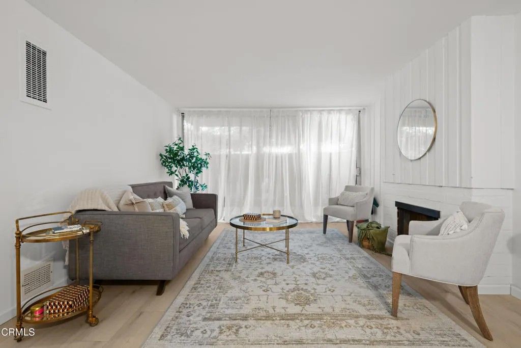 Photo of 6355 Green Valley Circle #101, Culver City, CA 90230 (MLS # P1-25600)