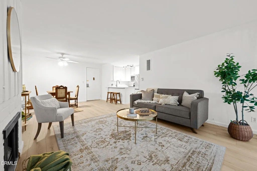 Photo of 6355 Green Valley Circle #101, Culver City, CA 90230 (MLS # P1-25600)