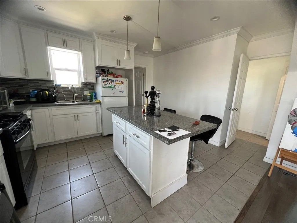 Photo of 3935 E Cesar E Chavez Ave, Los Angeles, CA 90063 (MLS # GD25281761)