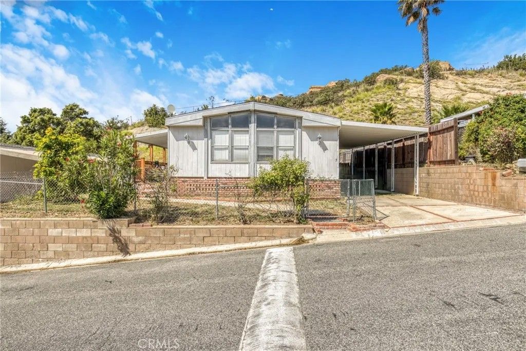 Photo of 24425 Woolsey Canyon #5, West Hills, CA 91304 (MLS # SR26067785)