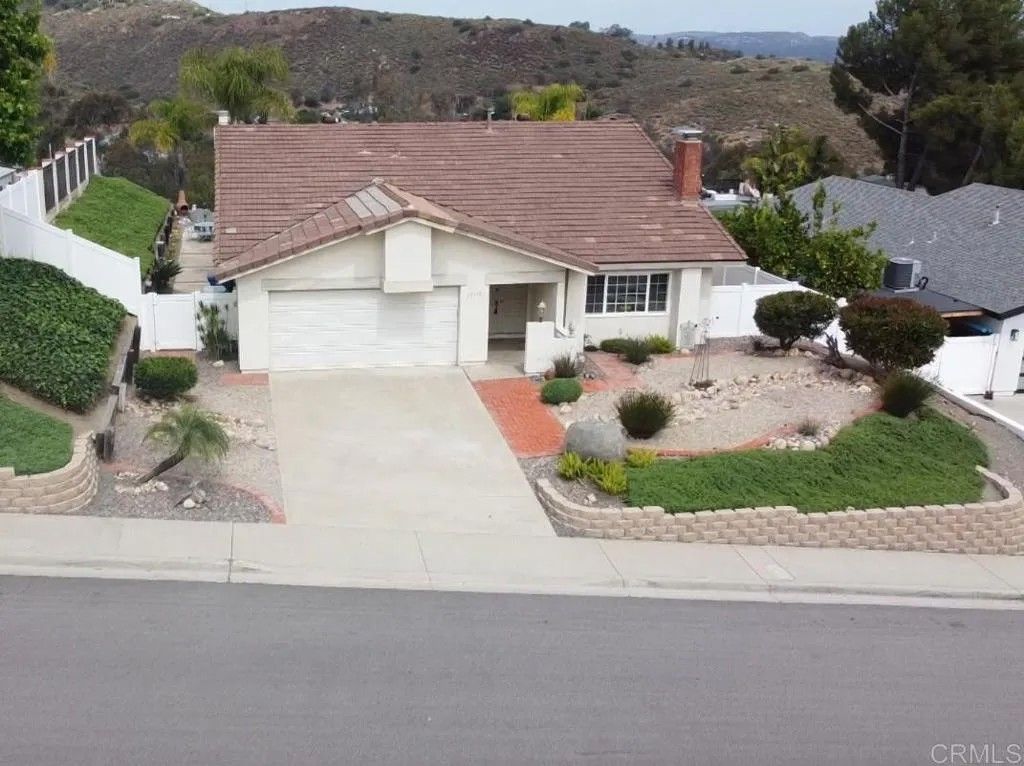 Photo of 12532 Ridgeton Dr, Lakeside, CA 92040 (MLS # PTP2603404)