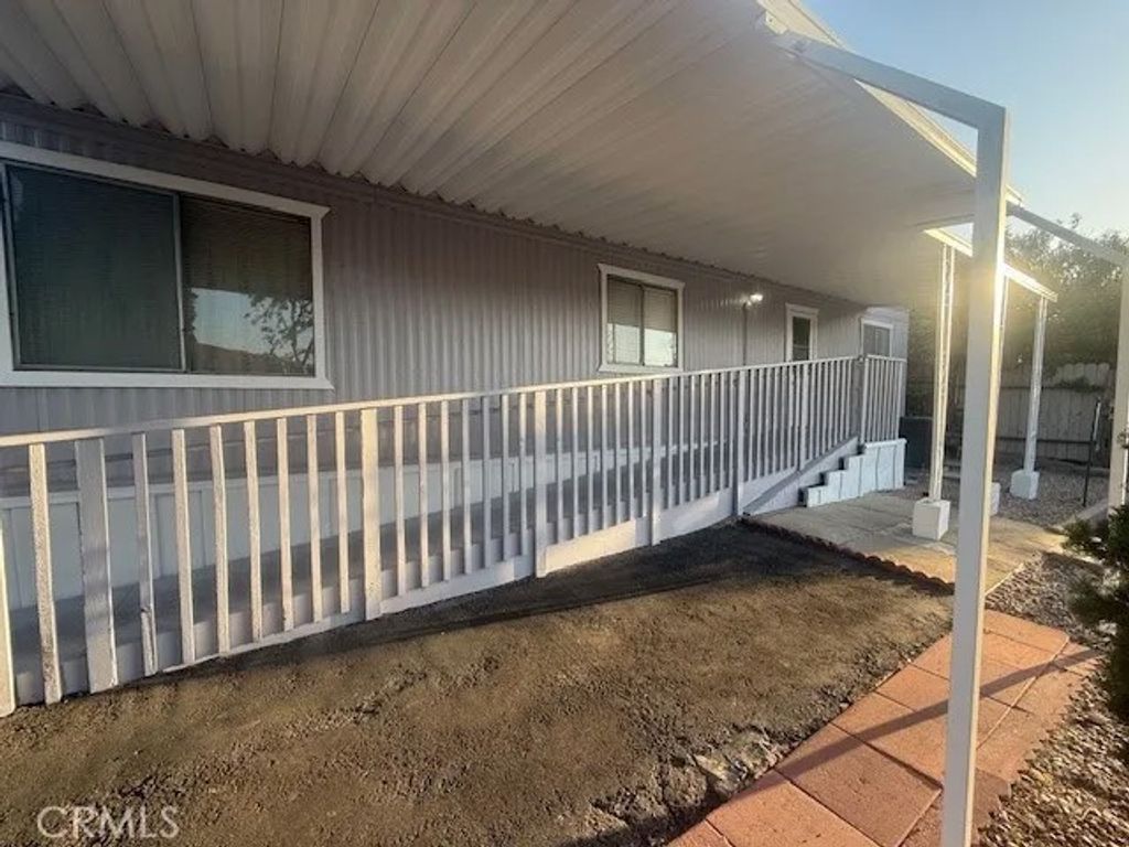 Photo of 995 Pomona Rd #88, Corona, CA 92882 (MLS # IG25276313)