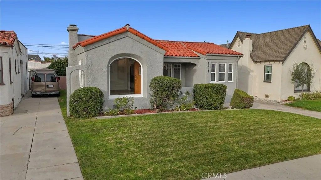 Photo of 1937 W 80th Street, Los Angeles, CA 90047 (MLS # SB26038163)