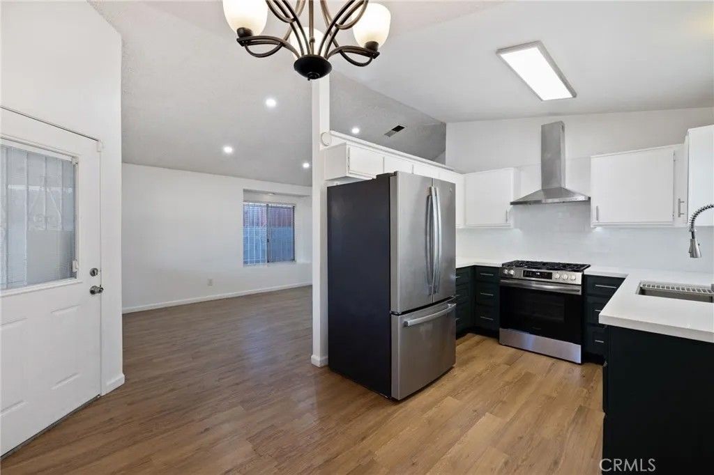 Photo of 310 S Paulsen Ave, Compton, CA 90220 (MLS # PW25273418)