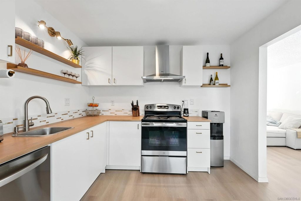 Photo of 6929 Park Mesa Way #126, San Diego, CA 92111 (MLS # 250043977)