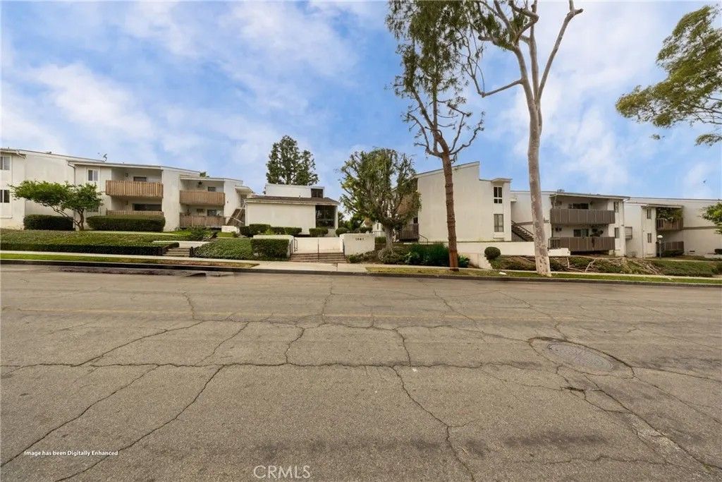 Photo of 1661 Neil Armstrong St #231, Montebello, CA 90640 (MLS # TR25273397)