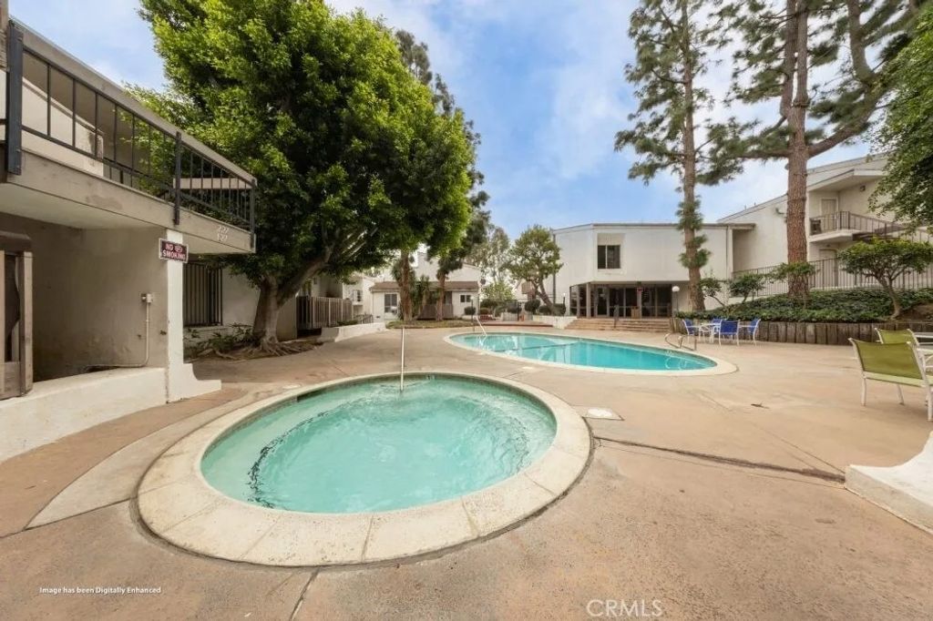 Photo of 1661 Neil Armstrong St #231, Montebello, CA 90640 (MLS # TR25273397)