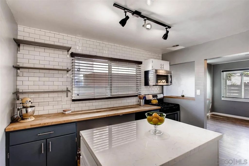 Photo of 4458 Copeland Ave, San Diego, CA 92116 (MLS # 250042738)