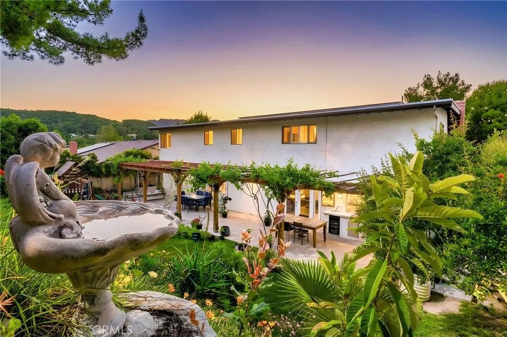 Photo of 24668 Ebelden Avenue, Newhall, CA 91321 (MLS # GD26077046)